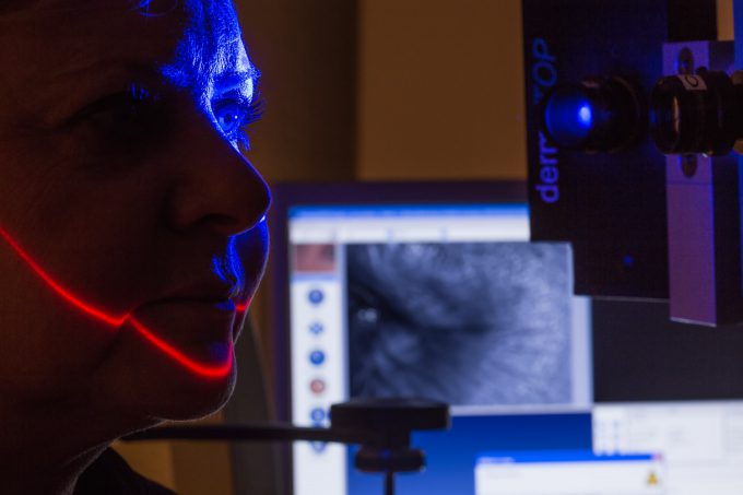 Clinical dermatological testing performed by an Abich technician for comprehensive safety and efficacies studies with specific skin imaging and analysis equipment